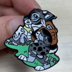 Lvanhound #6 - Lawrence - Sabertooth Bobcat Adventurer / Explorer Hard Enamel Pin