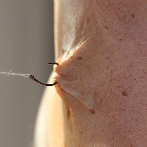 Pulled/Hooked Skin Silicone Prosthetic