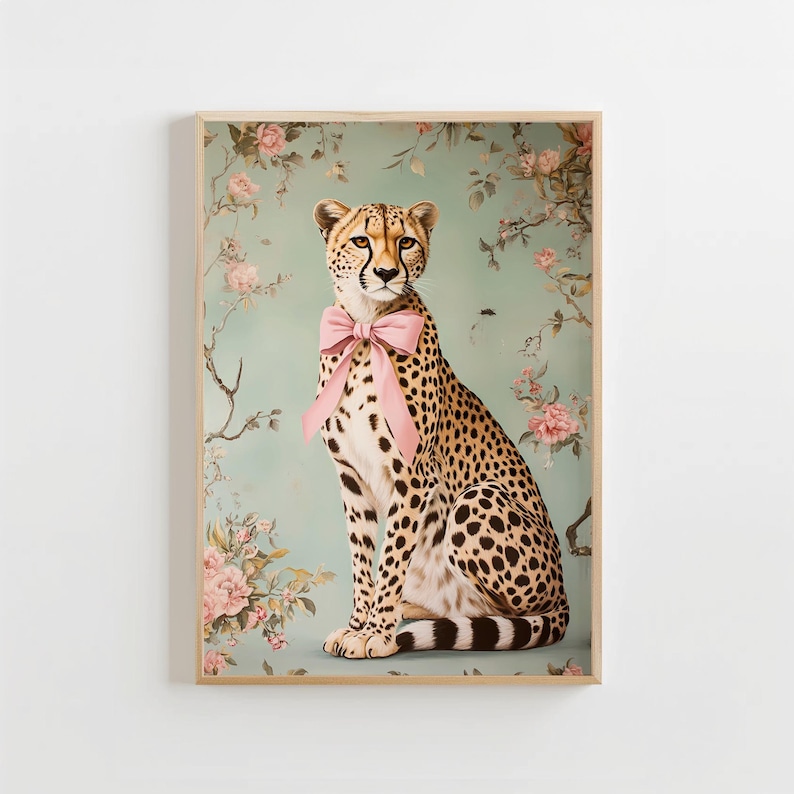 May include: A cheetah with a pink bow sitting in front of a floral background. The cheetah is looking directly at the viewer.