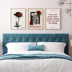 May include: Three framed prints with black and white illustrations and red roses. The first print features a single red rose with the text "I love you". The second print features two skeletons embracing with the text "Together Forever". The third print features the text "True Love doesn't have a happy ending. True Love has NO ending."