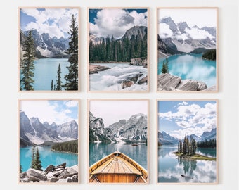 May include: Six framed landscape photographs of a lake surrounded by mountains. The lake is a vibrant blue and the mountains are snow-capped. Some of the photos feature a wooden boat on the lake.