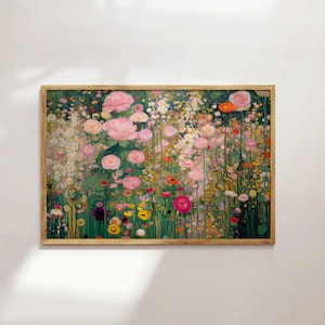 May include: A rectangular framed wall art print featuring a dense garden scene filled with numerous pink, white, yellow, and orange flowers on thin green stems. The artwork is encased in a light-toned wooden frame with a natural grain finish.