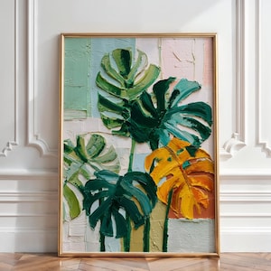 May include: A rectangular wall art piece featuring a thick, textured impasto oil painting of monstera leaves. The leaves are rendered in shades of deep green, forest green, and a single vibrant yellow leaf, set against a background of pastel stripes.