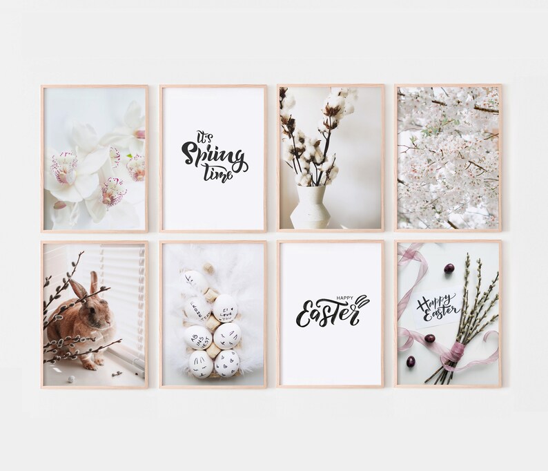May include: A set of eight framed prints with a spring and Easter theme. The prints feature images of white flowers, a vase of cotton, a bunny rabbit, Easter eggs, and the text "It's Spring Time" and "Happy Easter".