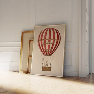 May include: A vintage-style illustration of a red and white striped hot air balloon with a wicker basket. The balloon is floating in the air against a beige background.