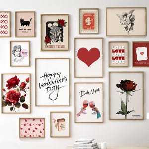 May include: A gallery wall of 12 framed prints with Valentine's Day themes. The prints feature hearts, roses, skeletons, cupids, and text that says "Happy Valentine's Day", "Date Night", "Love", "I'm lucky to have you", and "I love you".