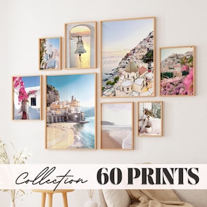 May include: A collection of framed prints featuring various coastal scenes, including a bell tower, a cityscape, and a beach. The prints are arranged in a grid pattern on a white wall. The text "Collection 60 Prints" is displayed below the prints.