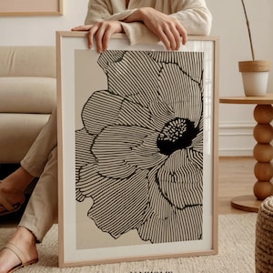 Neutralny, abstrakcyjny wydruk artystyczny z kwiatowymi liniami, minimalistyczny, nowoczesny plakat z czarno-beżowymi kwiatami, do pobrania w wersji cyfrowej