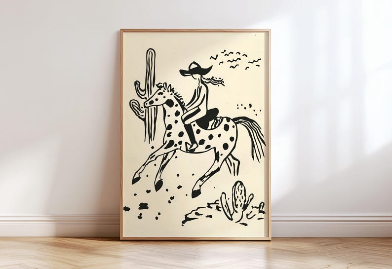 May include: Black and white illustration of a person riding a horse in a desert landscape. The person is wearing a cowboy hat and the horse has spots. There are cacti and birds in the background.