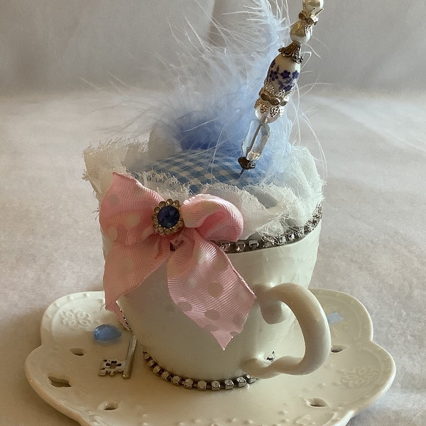 Teacup and saucer pincushion white porcelain blue feather silver key charm blue heart pink polka dot bow shabby chic ivory ruffle stickpins
