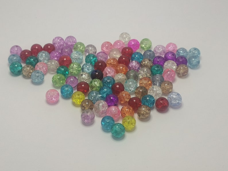 drilled hole approximately 1mm transparent round mixed colours approximately 4mm 100 tiny crackle glass beads