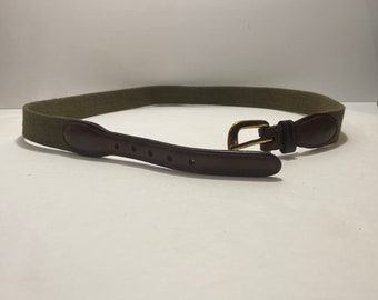 May include: A brown leather belt with a green canvas strap and a gold buckle.