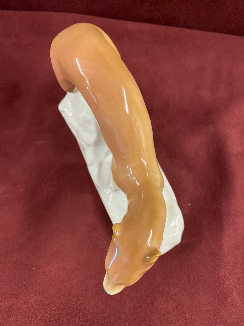 I believe Excellent figurine Vintage Porcelain Mink or Weasel by Galluba and Hofmann numbered 5286 6-12 long