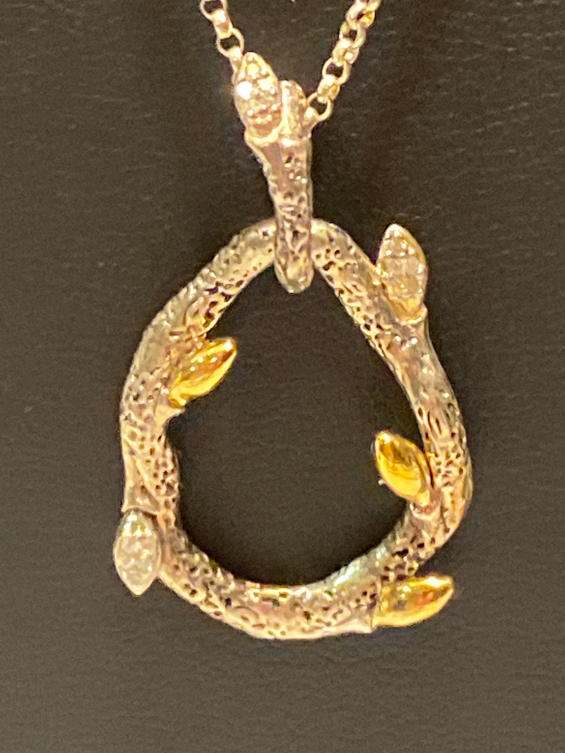 Vintage Dweck Diamonds 925 Sterling Silver with Gold Accents Pendant Necklace, 17-1/2" chain, approximately 1" by 3/4" in diameter