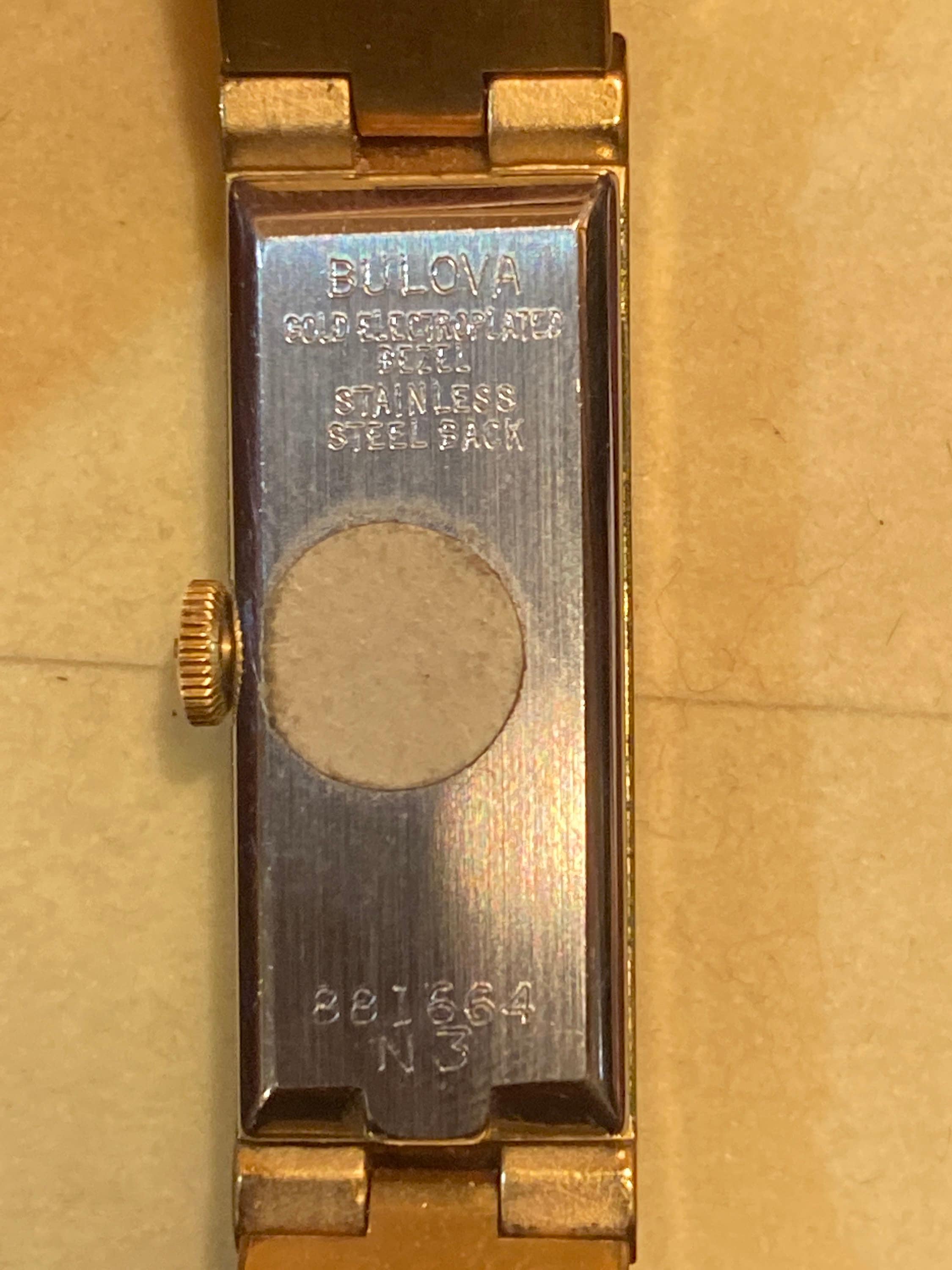 Vintage Bulova Women\'s Stainless Steel Band Watch with Gold Electroplated Bezel il_fullxfull.3029522252_j91t.jpg main image 2