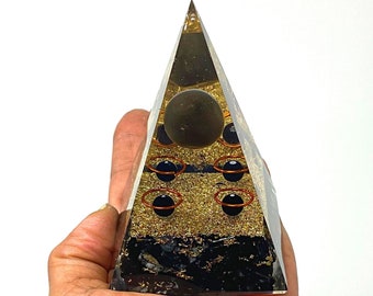 Black Tourmaline Chakra Healing Pyramid for Meditation, Protection, and Spiritual Connection.