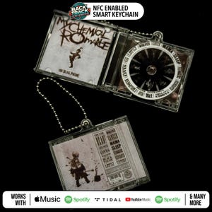 May include: A clear plastic keychain with a small CD case featuring the album art for "The Black Parade" by My Chemical Romance. The keychain has a silver chain and a small disc with the band's logo.