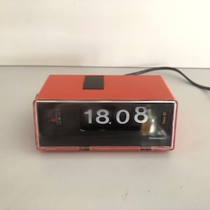 Garant Orange Flip Clock, Space Age Alarm Clock with night light, Germany, 70s