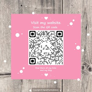 May include: Pink square with a black and white QR code in the center. The text "Visit my website. Scan the QR code." is above the QR code. The text "Find there all my links and my blog." is below the QR code. The text "Copyright &copy; AgotaPoplllustration" is at the bottom of the square.