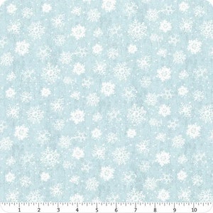 May include: A light blue fabric with a white snowflake pattern. The fabric is ideal for quilting, crafts, and other projects.