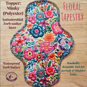 May include: Reusable floral tapestry pad with a minky polyester topper and antimicrobial zorb soaker layer. Features a waterproof zorb backer. The pad is washable and designed for periods and bladder leaks. Includes a pink snap closure.