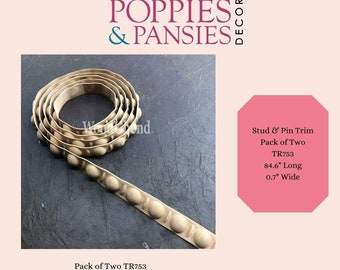 May include: A pack of two beige trim with a stud and pin design. The trim is 84.6 inches long and 0.7 inches wide. The trim is called "Stud & Pin Trim" and the pack is labeled "Pack of Two TR753".