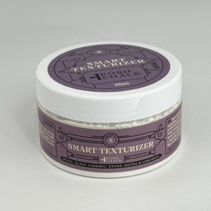 May include: A white jar with a purple label that says "Smart Texturizer" and "Posh Chalk". The jar is 110 ml and is for use on wood, glass, ceramic, stone, metal, and laminate.