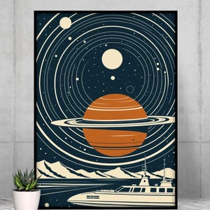 May include: A framed art print featuring a retro-style illustration of a planet with rings, set against a starry night sky. The artwork includes a stylized boat and mountain range in the foreground, with a color palette of navy, orange, and cream.