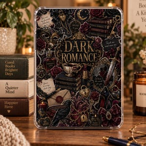 May include: A clear tablet case featuring a dark, gothic-inspired collage with the text "DARK ROMANCE" in the center. The design includes illustrations of roses, a dagger, a raven, books, a heart, a mask, and various romantic, dark-themed phrases.