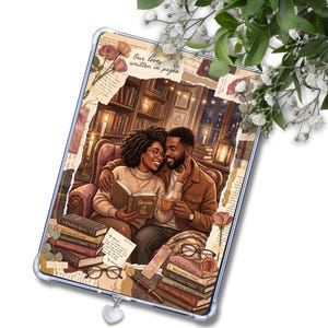 May include: Clear tablet case featuring a romantic illustration of a couple in a library, reading and drinking coffee. The case has a heart charm and is decorated with vintage paper and the text "Our love, written in pages" and "Stories of us."