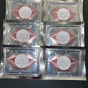 May include: Six individual packages of pink lip masks, each with the text "luxe Collagen & Hyaluronic Acid Lip Mask" printed on the front.