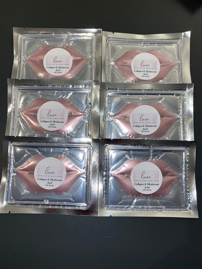 May include: Six individual packages of pink lip masks, each with the text "luxe Collagen & Hyaluronic Acid Lip Mask" printed on the front.
