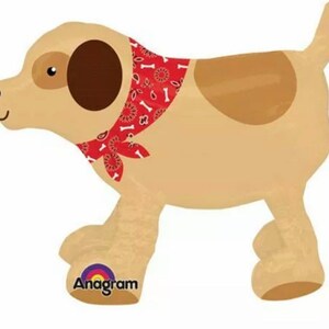 May include: A beige dog balloon with brown spots and a red bandana with white bone designs. The balloon has a walking pose and the text "Anagram" is printed on the bottom of one of the feet.
