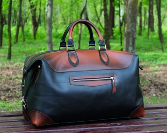 Bolsa de viaje de piel negra y marrón, bolsa de fin de semana.