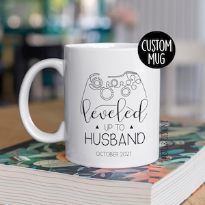Leveled Up To Husband Mug – Funny Gamer Themed Engagement Gift for Fiance or New Husband – Video Game Coffee Cup – Personalized Gift for Him