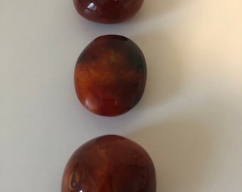 Carnelian palm stone. Carnelian crystal.