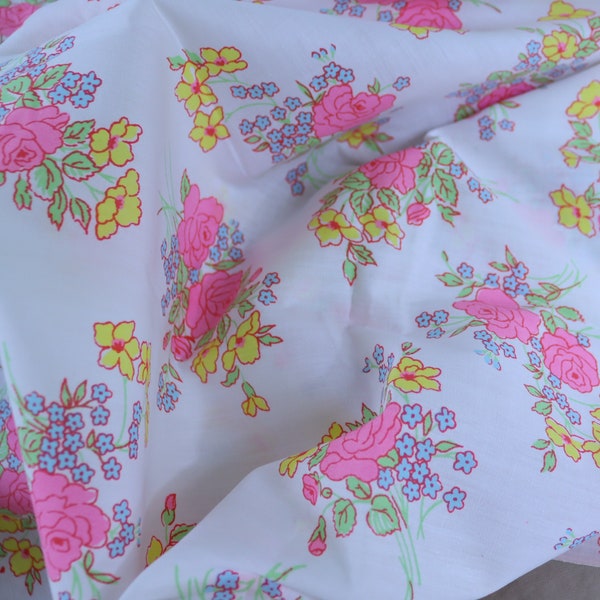 Vintage Floral Fabric with bright pink roses, blue forget-me-nots, bright yellow flowers for pretty summer dress, skirt, summer clothing