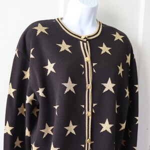 Black sweater with gold stars deals