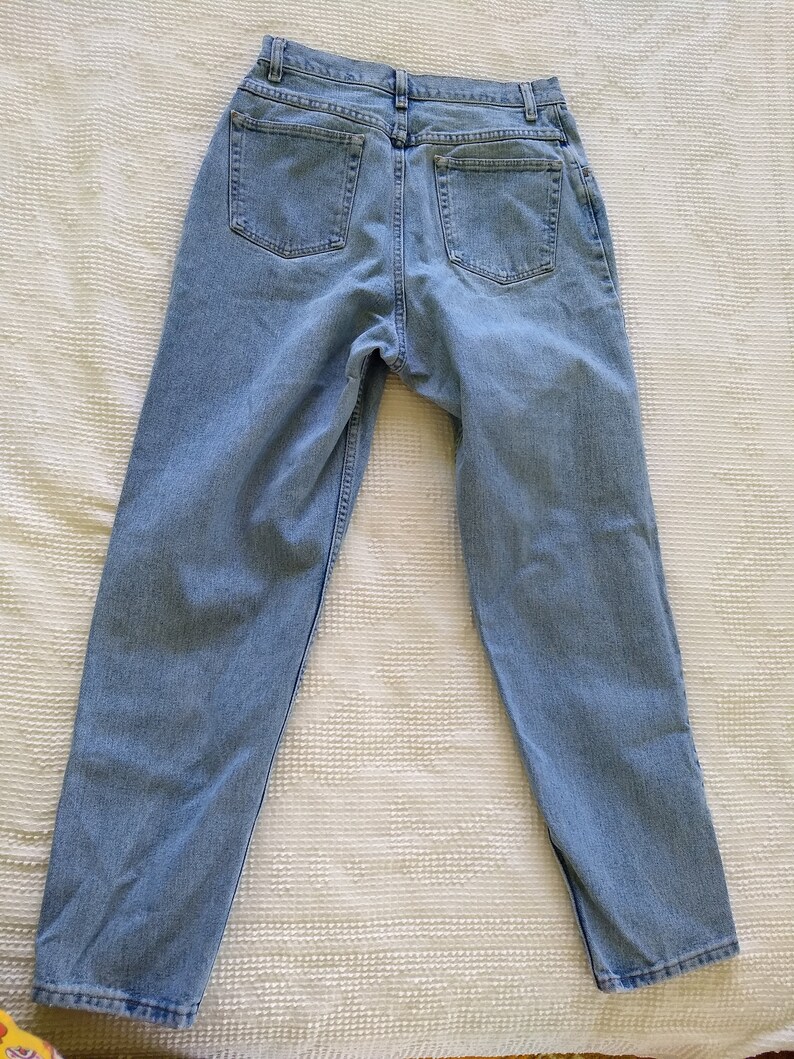 19801990s High Waisted High Rise Jeans by Wrangler