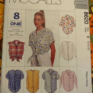 May include: A sewing pattern for eight different shirt styles. The pattern is called McCall's 8620 and includes sizes B (8, 10, 12). The pattern includes a variety of styles, including a sleeveless shirt, a long-sleeved shirt, and a short-sleeved shirt.