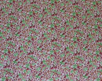 Tela de punto doble con pequeñas flores rosas de los años 70 - Tejido de punto doble de poliéster rosa y verde vintage para ropa retro o patchwork