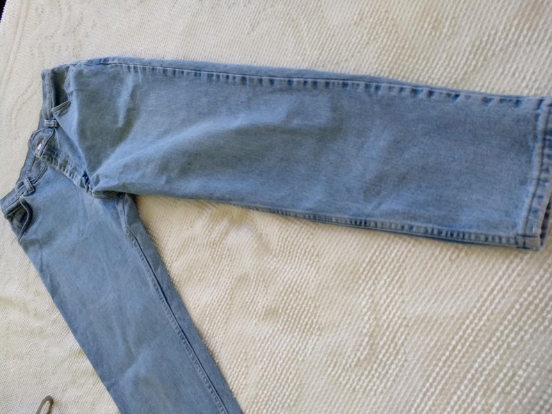 19801990s High Waisted High Rise Jeans by Wrangler