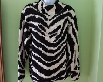 Suéter negro y marfil antipicazón - Suéter blanco y negro con cuello alto y rayas de cebra - Suéter antipicazón con mezcla de algodón y ramio y estampado animal