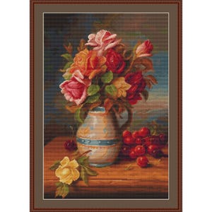 May include: A still life painting of a bouquet of red, pink, and yellow roses in a blue and white ceramic pitcher. The pitcher is sitting on a wooden table with a bowl of red cherries.