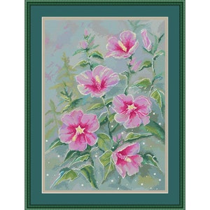 May include: A cross-stitch embroidery depicting pink hibiscus flowers with green leaves against a light blue background. The flowers are at different stages of bloom, some fully open and others still in bud. The background has a soft, watercolour-like effect.