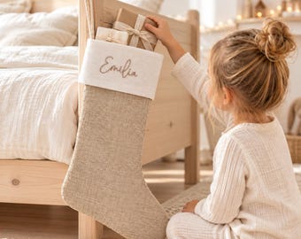 Personalized Santa stocking embroidered with the desired name in pink or grey glitter, made of jute in neutral colors