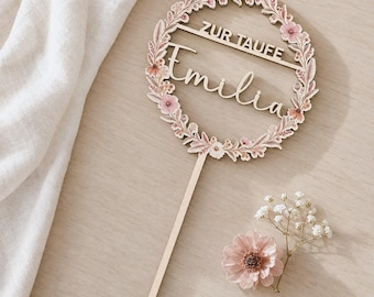 Personalized wooden cake topper "Flower Wreath" for christening, printed with a name and colorful pink flowers.
