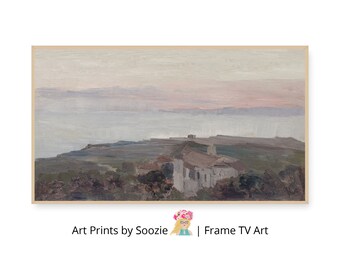 Op de afbeelding: Een ingelijst landschapsschilderij dat een kustscène met een gebouw en een waterpartij toont. Het kunstwerk gebruikt gedempte tinten grijs, groen en roze, met de tekst "Art Prints by Soozie | Frame TV Art" onderaan.