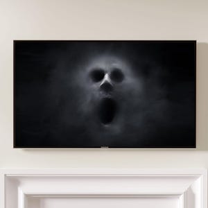 May include: A black and white image of a face emerging from a cloud of smoke, with an open mouth. The image is displayed on a Samsung television mounted above a white fireplace.