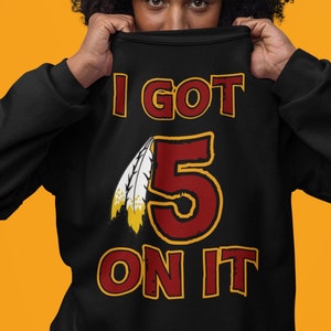 May include: Black sweatshirt with a red and yellow graphic that says "I got 5 on it".